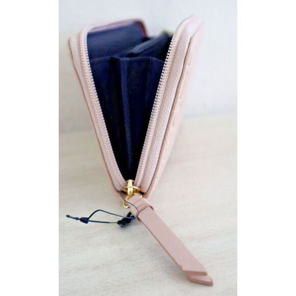 Tommy Hilfiger Women's Pink Logo Embossed Zip Around PU Leather Wallet - Picture 4 of 7